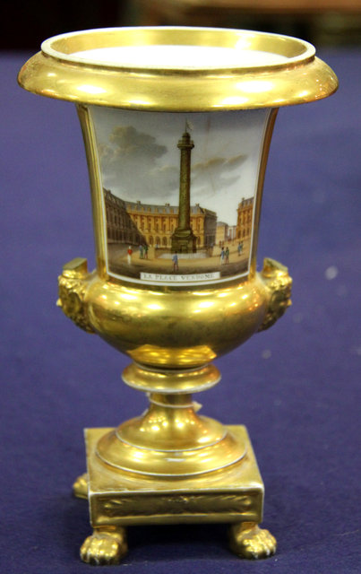 Appraisal: A Paris porcelain urn painted two Paris scenes La Porte