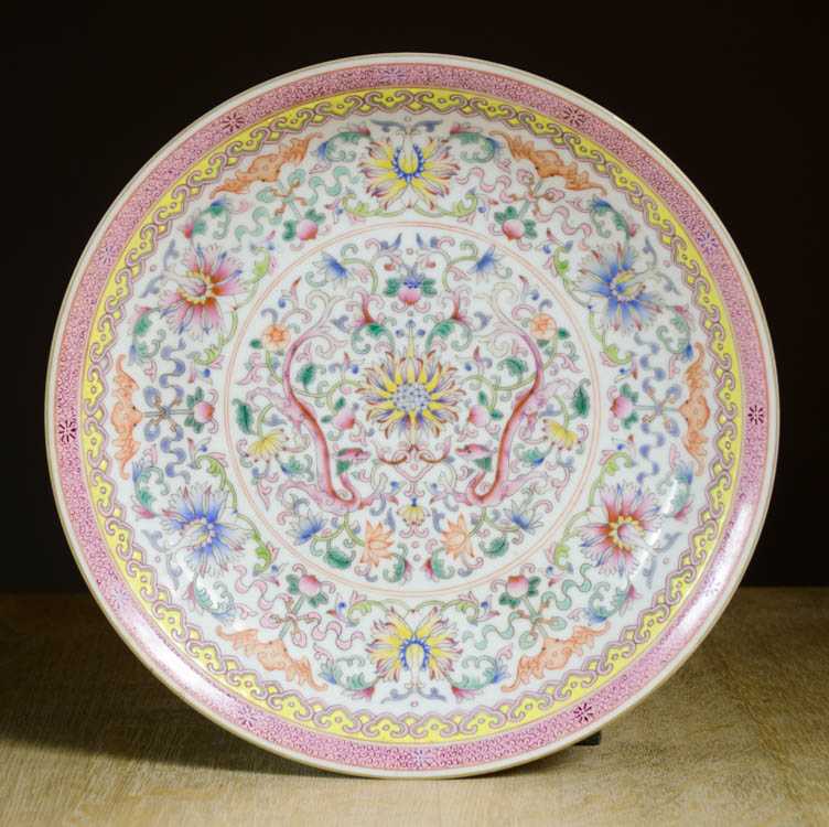 Appraisal: CHINESE FAMILLE ROSE PORCELAIN BOWL with low profile finely painted