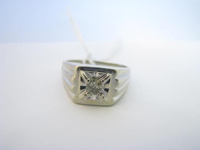 Appraisal: A K white gold gent's ring with approximately ct flush-mount