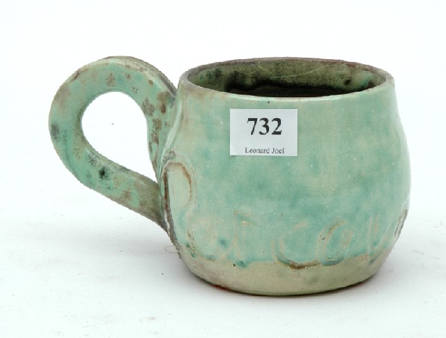 Appraisal: JOHN PERCEVAL Victoria circa Compressed cylindrical earthenware mug pale green