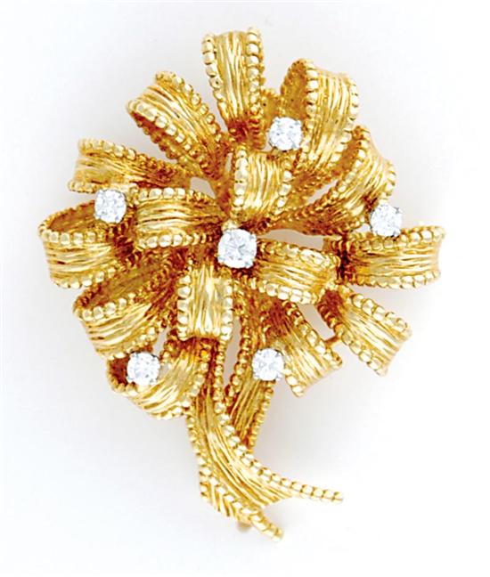 Appraisal: Gold and diamond ribbon-form brooch six full-cut diamonds ctw color