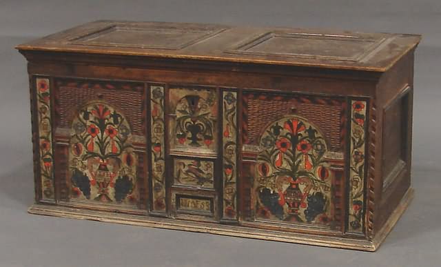 Appraisal: Lift top with twin molded panels and shaped strapwork hinges