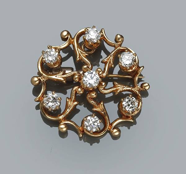 Appraisal: A diamond starburst brooch-pendant estimated total diamond weight carats mounted