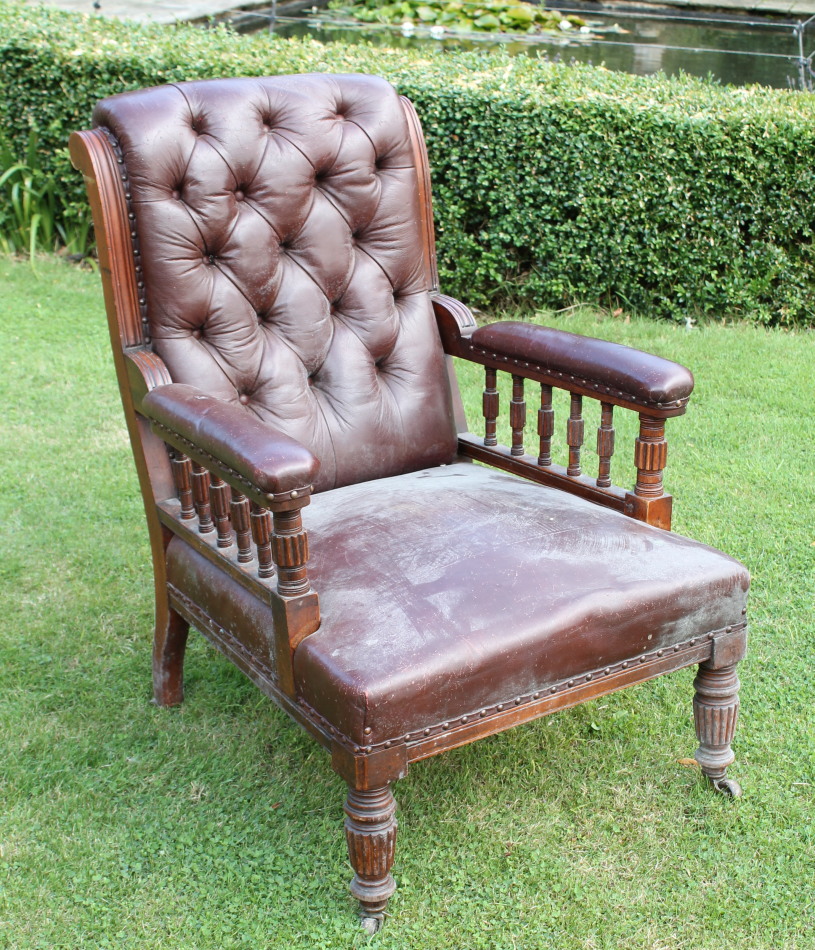 Appraisal: A Victorian mahogany library chair with galleried arms reeded legs