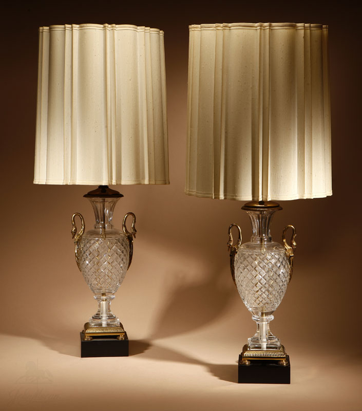 Appraisal: A pair of Louis XVI style cut glass vases mounted