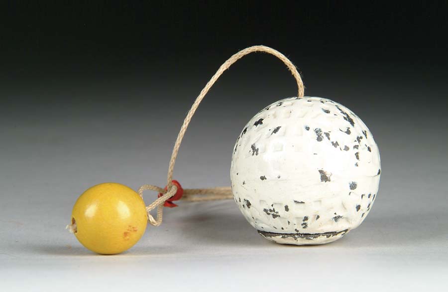 Appraisal: WHITE GOLF BALL TOY CAP BOMB BOMB Manufactured by Hubley