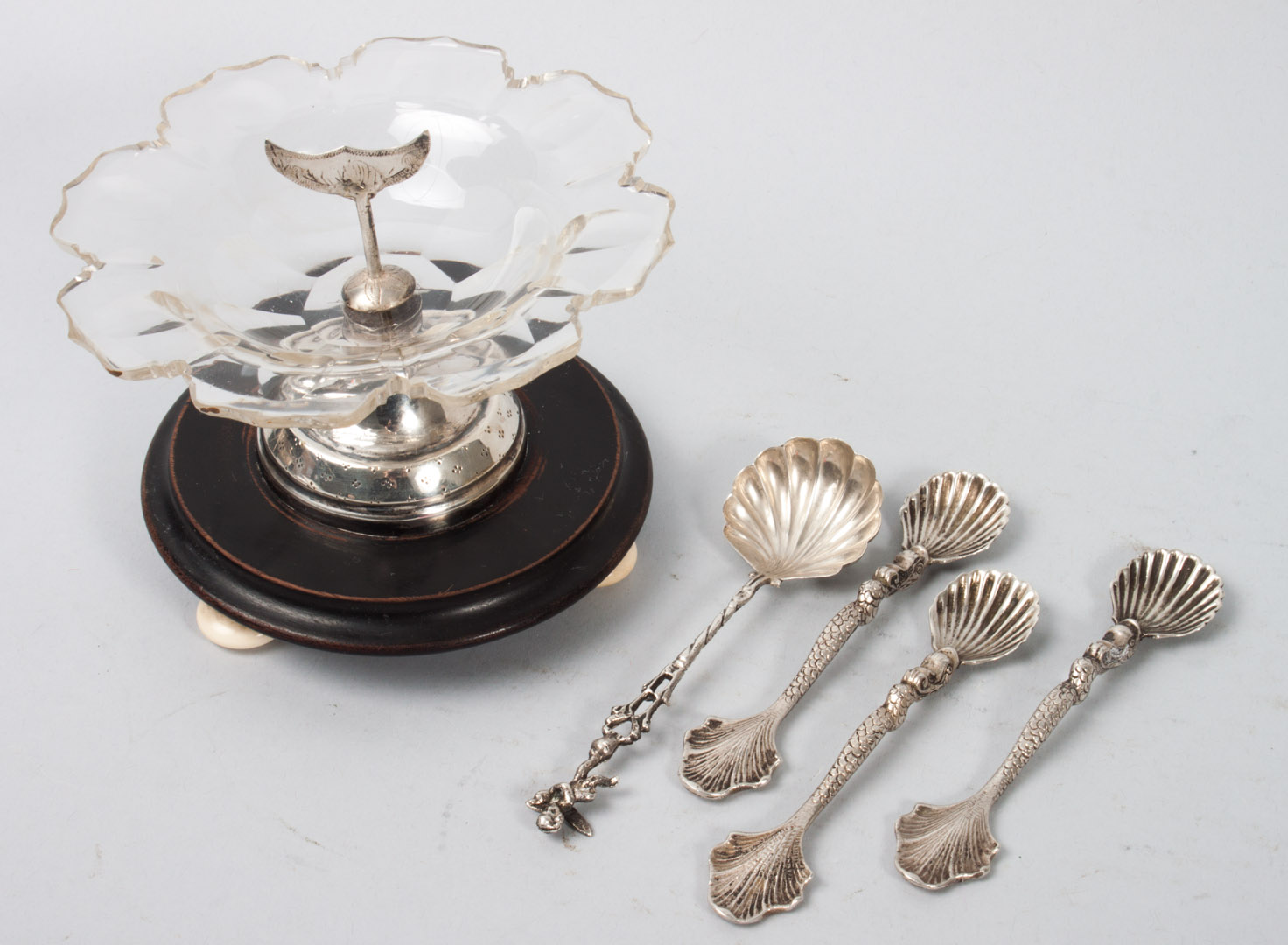 Appraisal: French silver and cut glass master salt on a mahogany