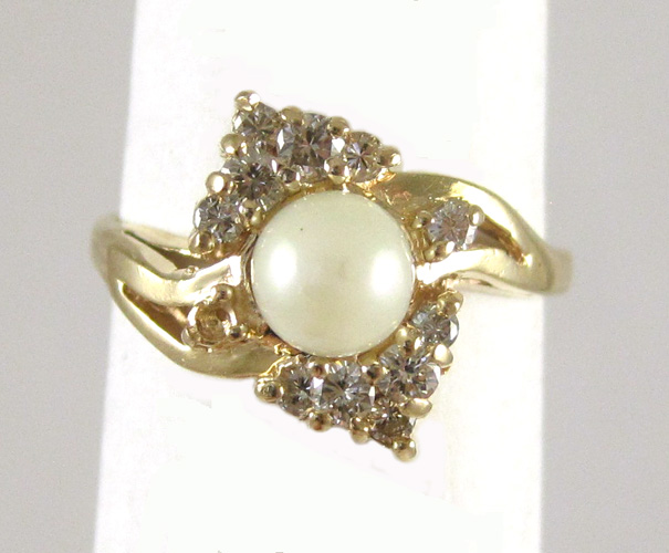 Appraisal: PEARL DIAMOND AND FOURTEEN KARAT GOLD RING with eleven round-cut