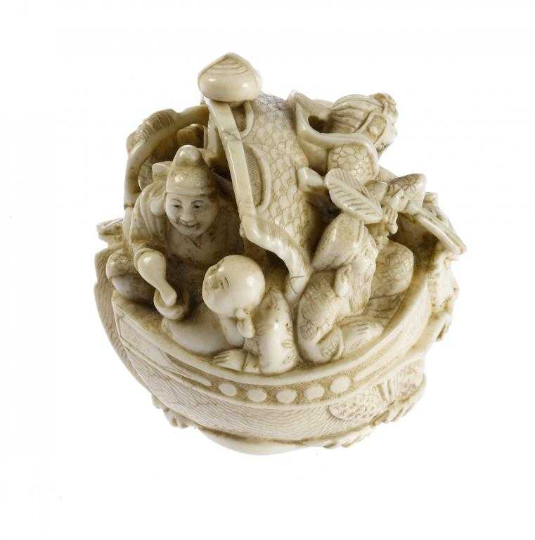 Appraisal: AN IVORY NETSUKE OF THE TAKARABUNE the ship with dragon