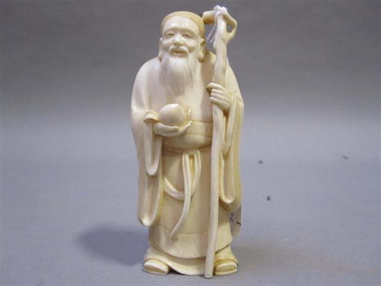 Appraisal: JAPANESE IVORY OKIMONO OF A BEARDED ELDER th C Holding