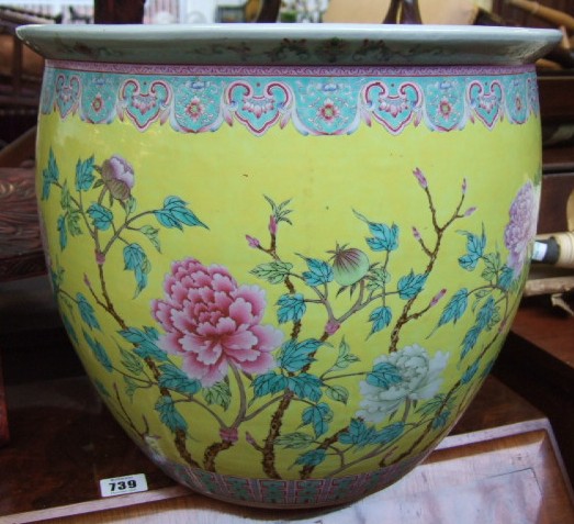 Appraisal: A pair of yellow-ground 'famille-rose' jardiniere th century of U