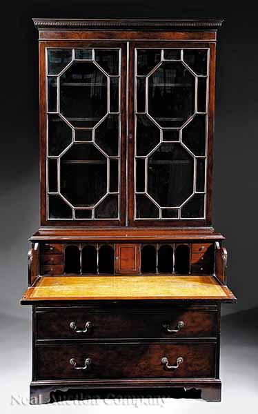 Appraisal: A George III-Style Mahogany Secretary Bookcase having a dentil molded