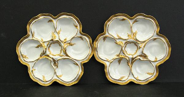 Appraisal: A set of nine Limoges porcelain oyster plates retailed by