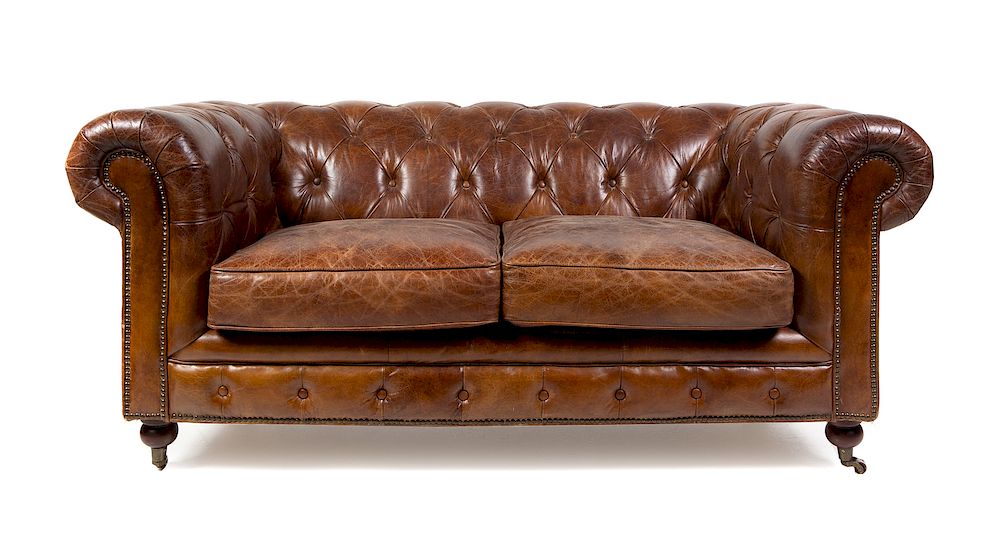 Appraisal: A Leather Upholstered Chesterfield Sofa Height x width x depth