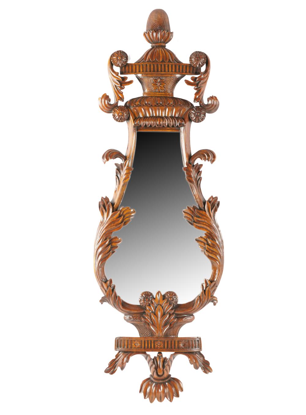 Appraisal: CARVED WALNUT WALL MIRRORthe beveled mirror plate within a lyre-shaped