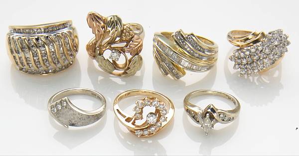 Appraisal: A collection of seven diamond k and k gold rings