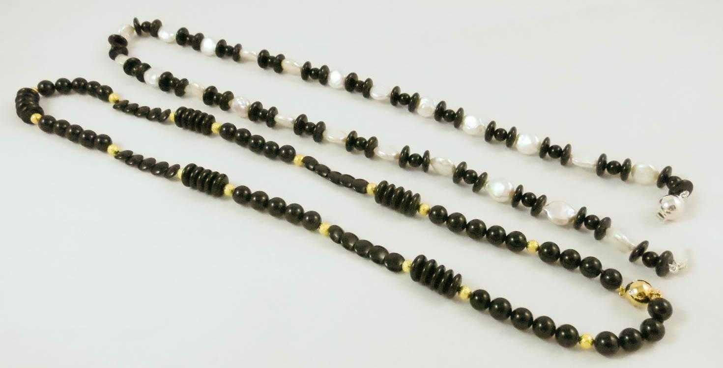 Appraisal: TWO BLACK ONYX BEAD NECKLACES including a - inch necklace