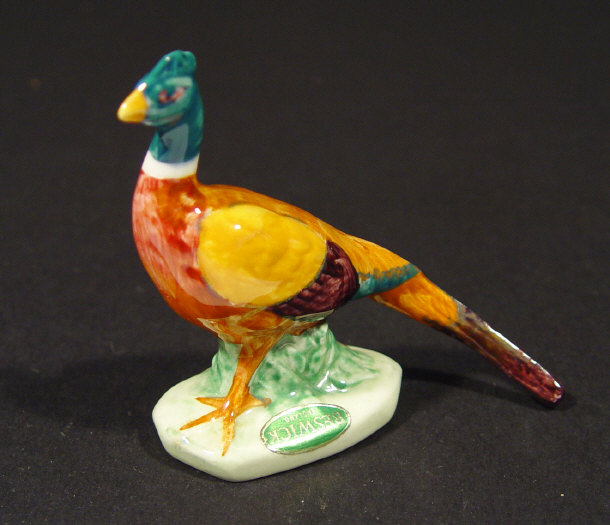 Appraisal: Small Beswick pheasant with hand painted decoration paper label and