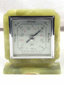 Appraisal: An Art Deco style green onyx aneroid barometer circa