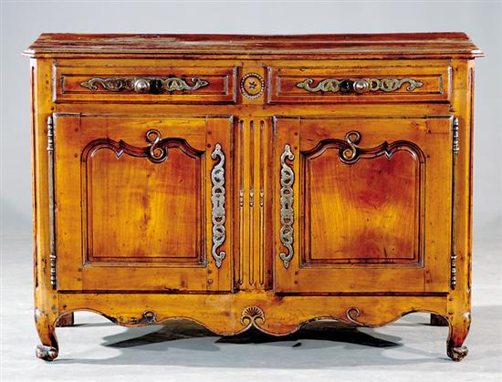 Appraisal: French Provincial fruitwood buffet th century molded rectangular top above