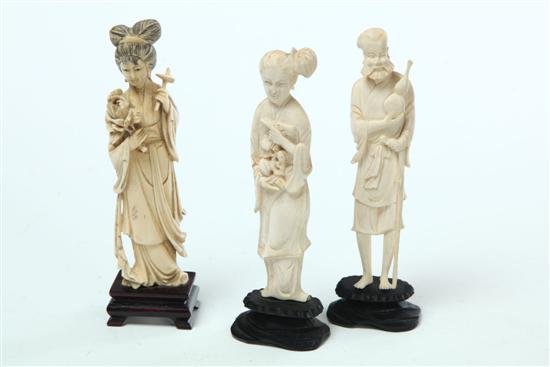 Appraisal: THREE IVORY CARVINGS China early th century Two women with