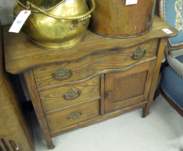 Appraisal: LATE VICTORIAN ASHWOOD COMMODE American c the front having a