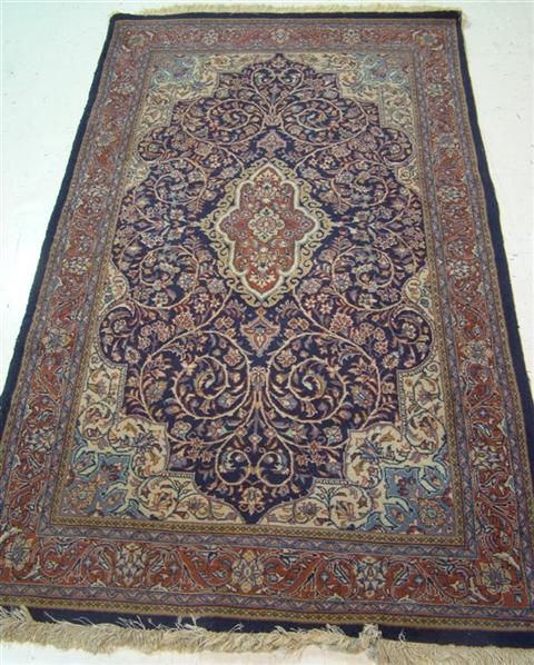 Appraisal: RUG NAVY AND BROWN x INCHES