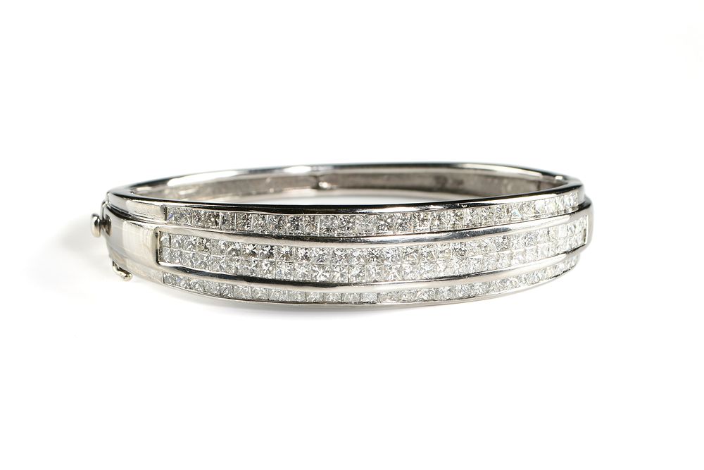 Appraisal: A K WHITE GOLD AND DIAMOND BANGLE BRACELET A K