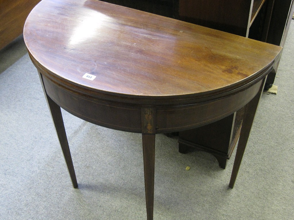 Appraisal: Georgian mahogany and inlaid demi-lune fold over tea table