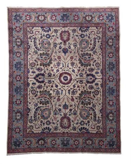 Appraisal: A Tabriz carpet early th century the cream field with