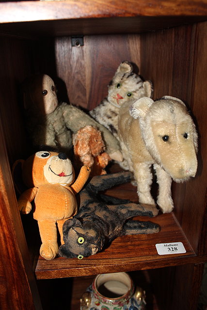 Appraisal: A SMALL GROUP OF TOY ANIMALS to include a Merrythought