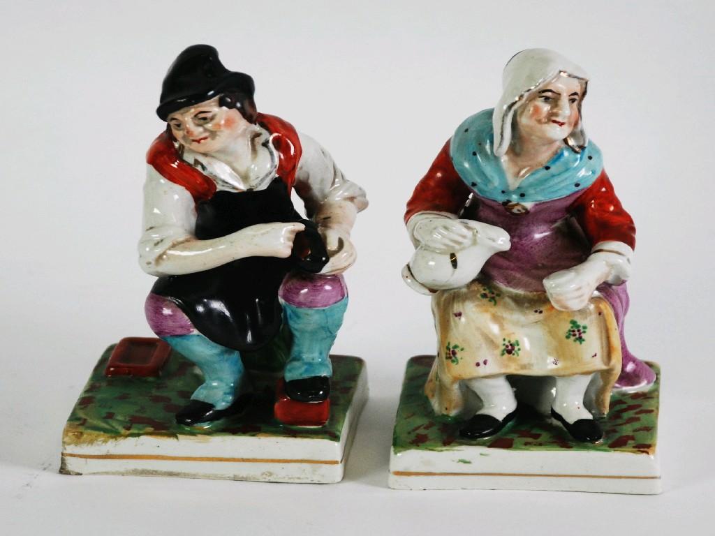 Appraisal: PAIR OF NINETEENTH CENTURY STAFFORDSHIRE FIGURES COBBLER AND HIS WIFE