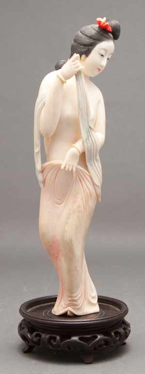 Appraisal: Japanese carved and polychrome ivory female semi-nude figure th century