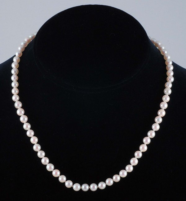 Appraisal: Cultured pearl necklace with marked K white gold reticulated clasp