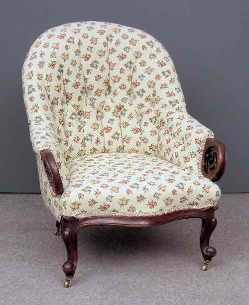 Appraisal: A Victorian mahogany framed spoon back easy chair with pierced