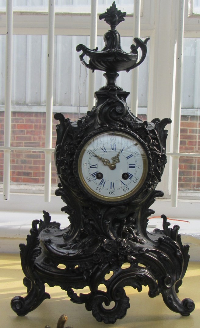 Appraisal: A composite bronze mantel clock early th century of rococo