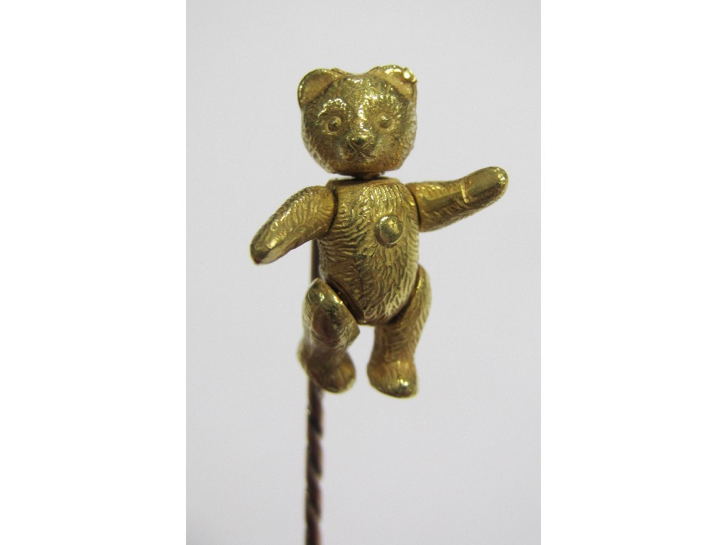 Appraisal: A gold stick pin with hallmarked ct gold teddy with