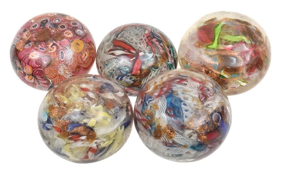 Appraisal: FIVE CANDY GLASS PAPERWEIGHTS SOME A F