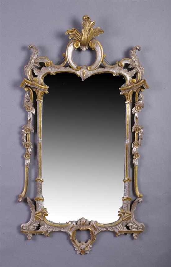 Appraisal: ITALIAN CONTEMPORARY ROCOCO STYLE MIRROR WITH SILVER AND GOLD GILT