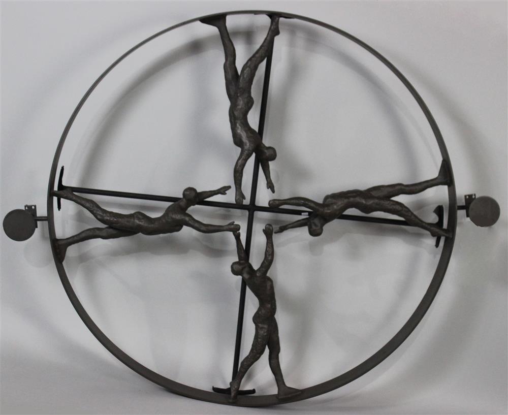 Appraisal: REACHING FOR CENTER Large metal wall sculpture