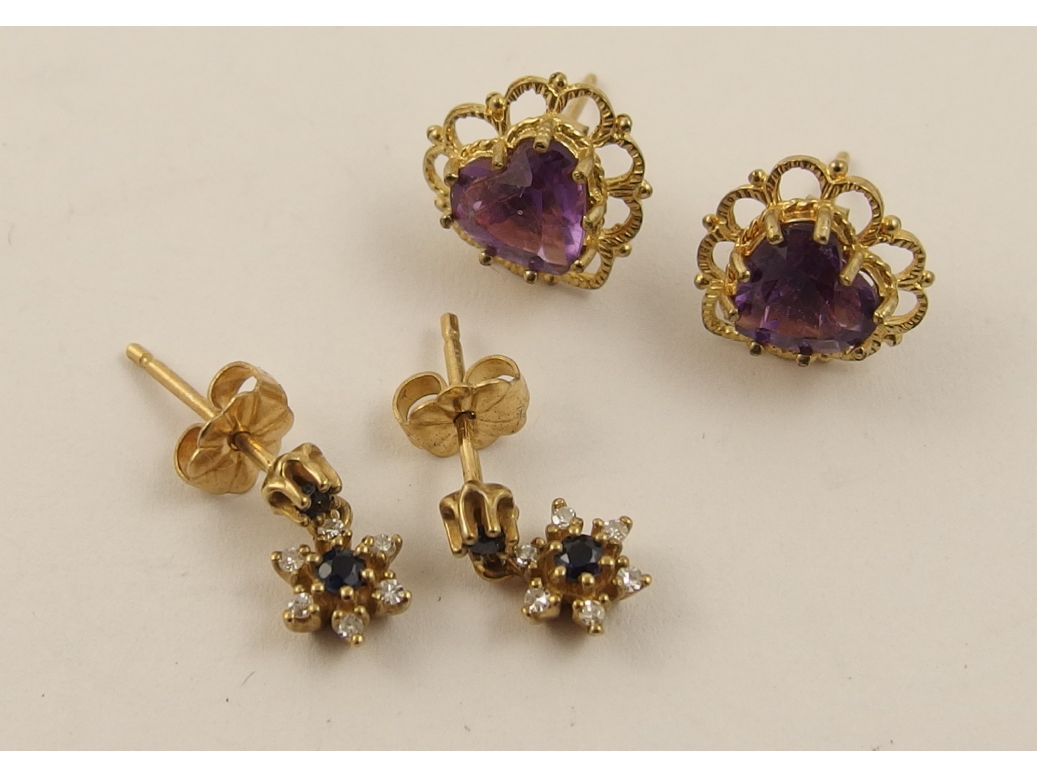 Appraisal: A pair of ct diamond and flower earrings and another