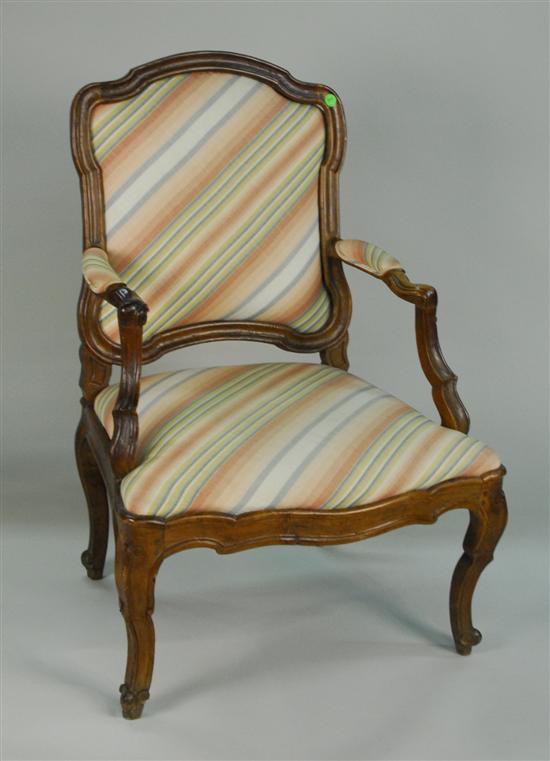 Appraisal: ITALIAN CARVED FRUITWOOD OPEN ARMCHAIR circa with cabriole legs