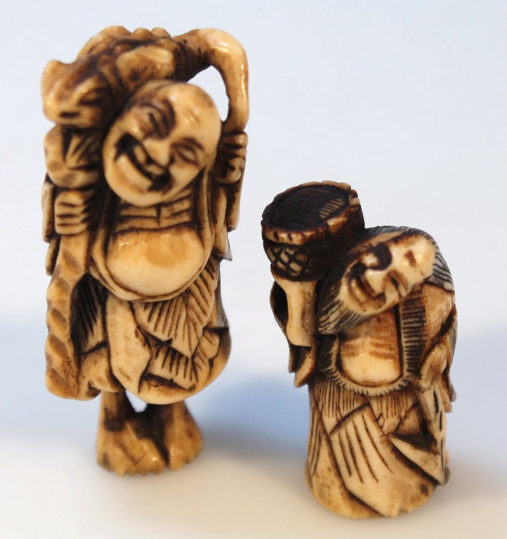 Appraisal: Two Japanese netsuke the first formed as a figure in