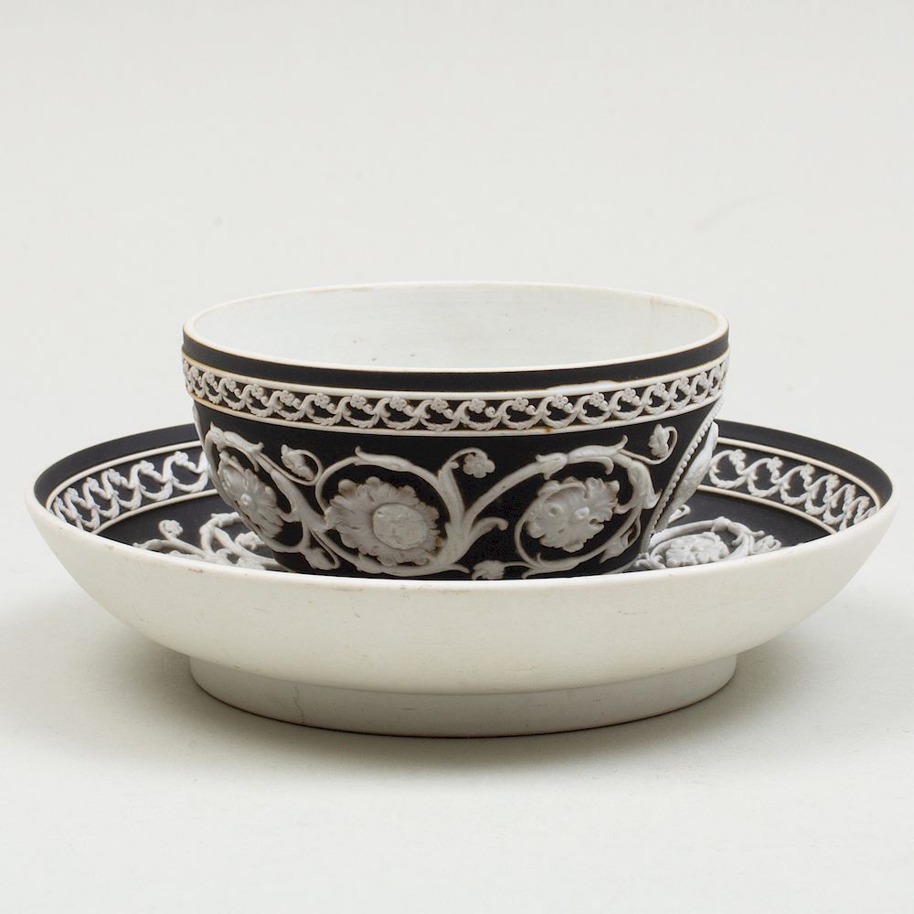 Appraisal: Wedgwood Black and White Jasperware Cylindrical Cup and Saucer Cup