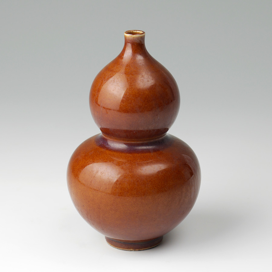 Appraisal: CHINESE BROWN GLAZE DOUBLE GOURD VASE Mottle brown glaze double