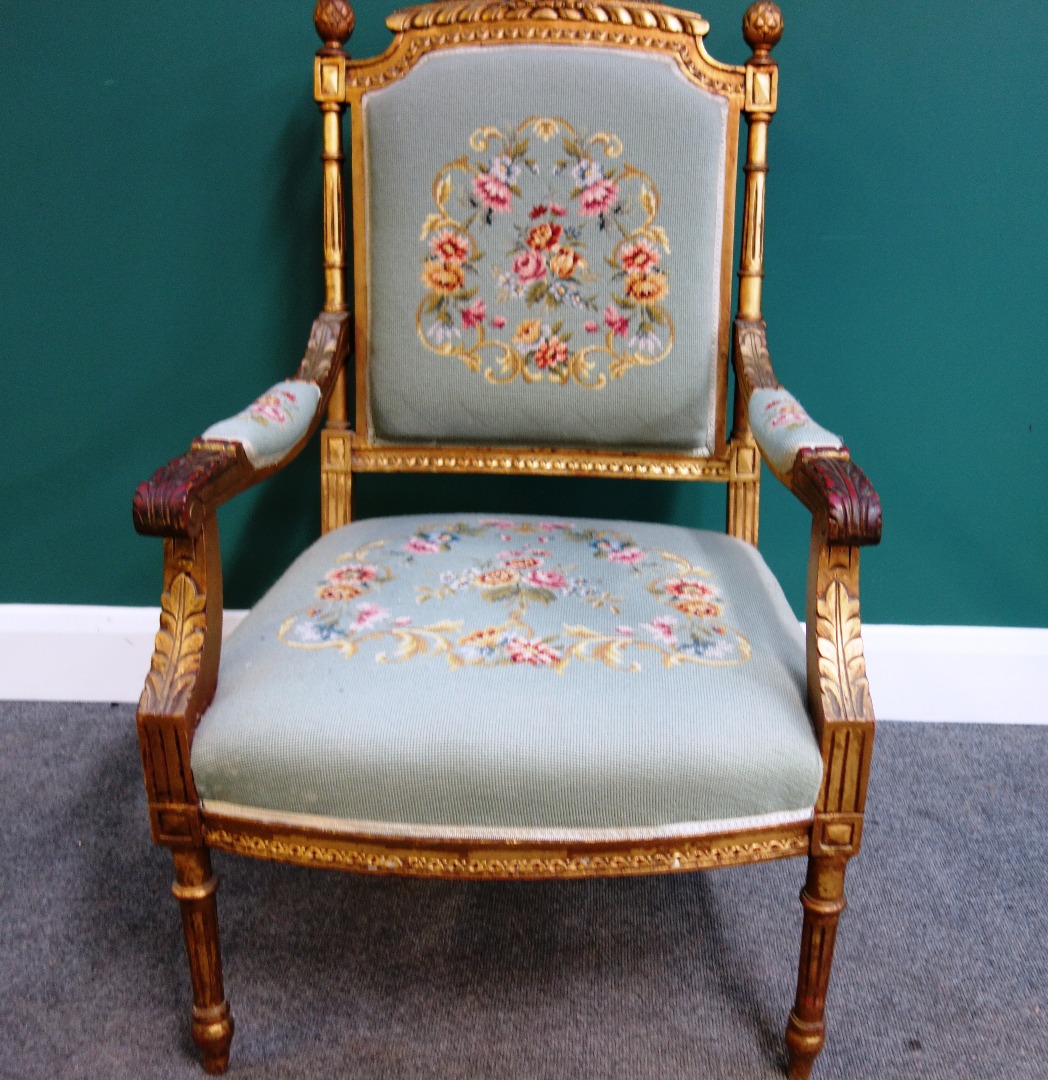 Appraisal: A Louis XVI style gilt framed open armchair with bow