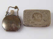 Appraisal: An engraved silver snuff or pill box with reeded sides