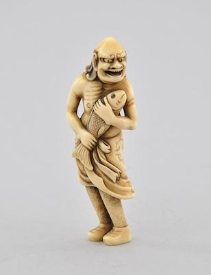 Appraisal: Gama Sennin with a Fish Netsuke Carved ivory of a