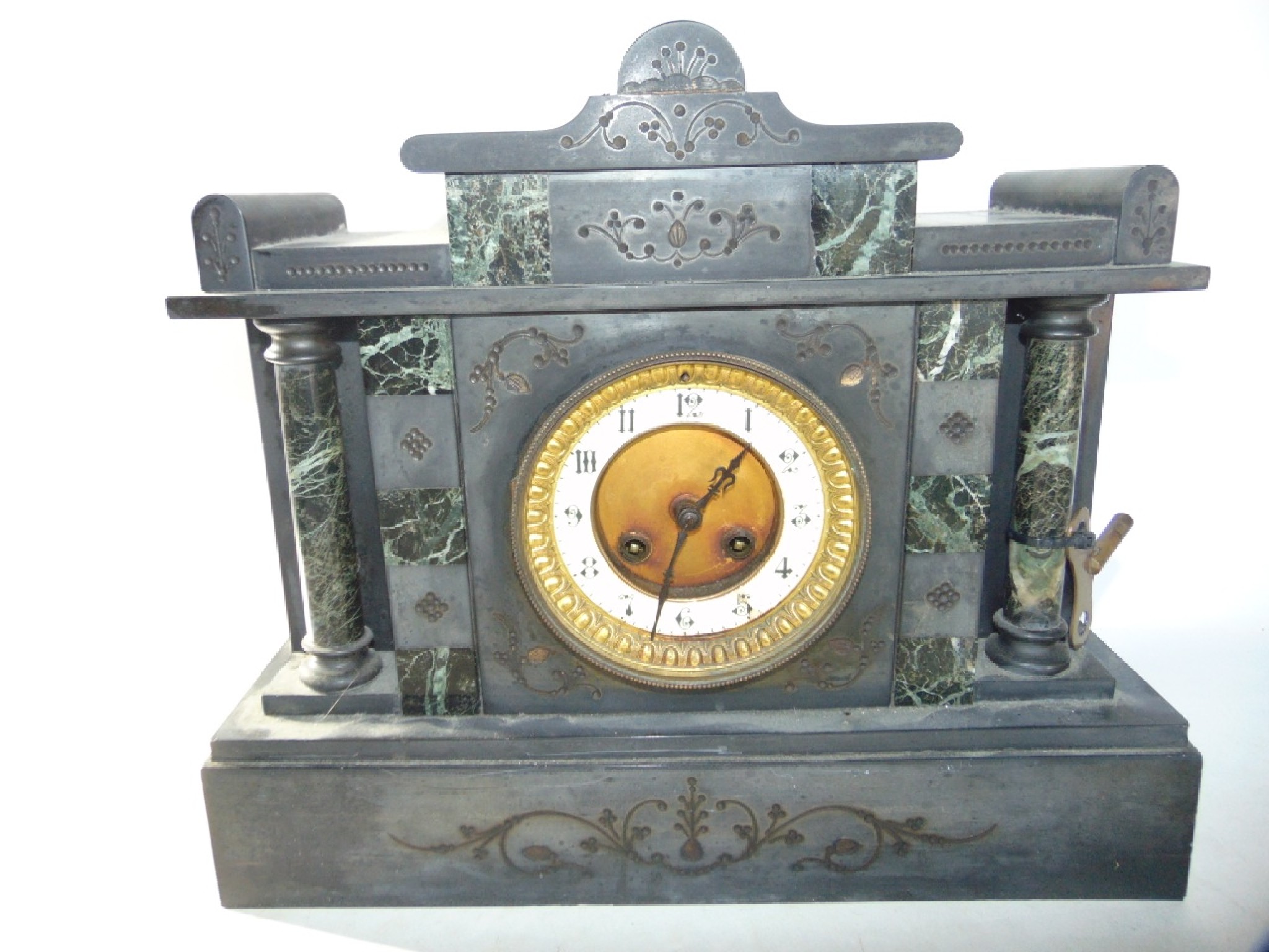 Appraisal: A Victorian black slate and polished marble mantle clock of