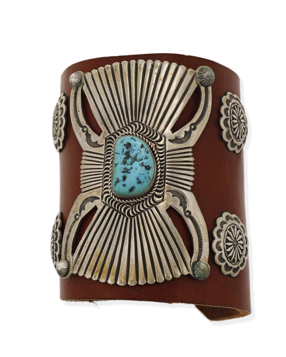 Appraisal: A Henry Morgan Navajo silver and turquoise ketoh arm guard